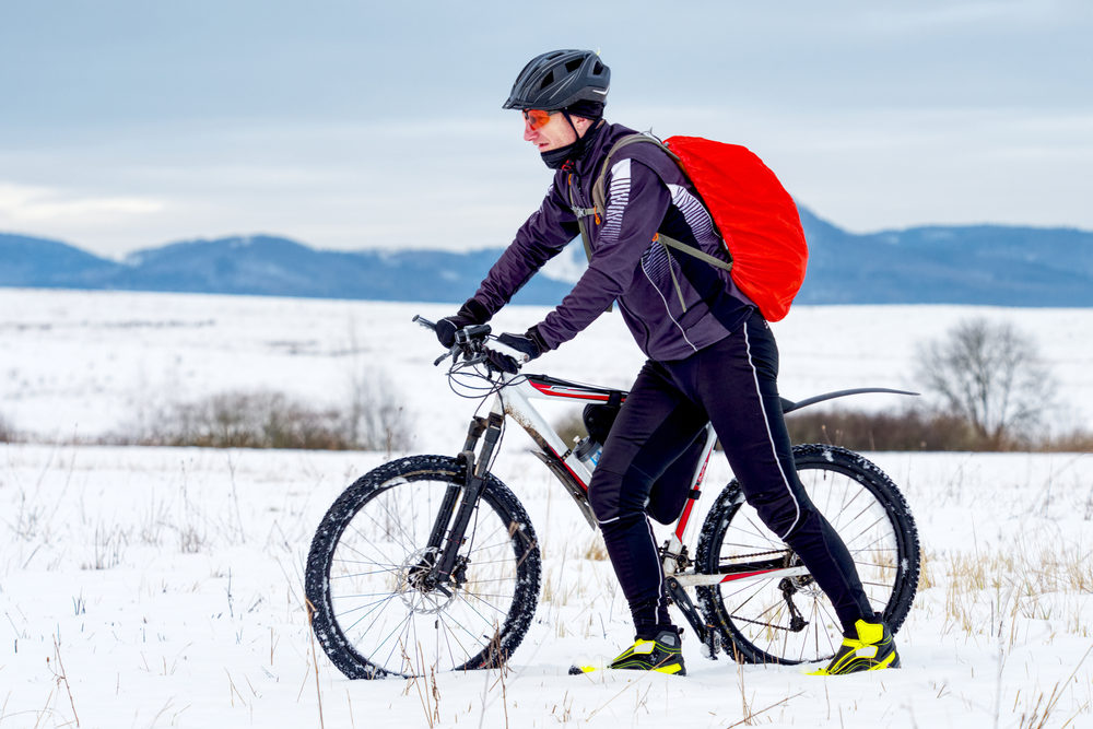 Cyclist,In,Black,Sport,Suit,Pushing,The,Mountain,Bike,On