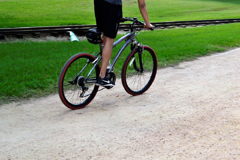 Should I pedal with my toes or heels